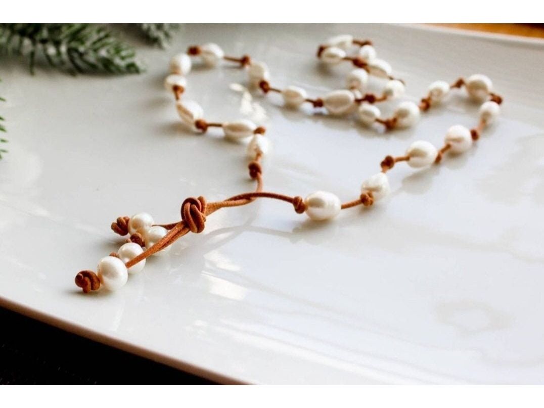 Baroque White Pearl knotted onto natural tan Leather necklace