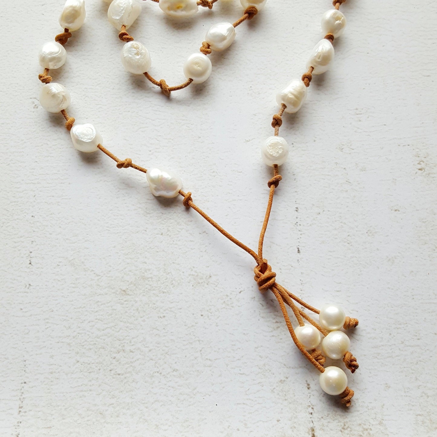 Baroque White Pearl knotted onto natural tan Leather necklace