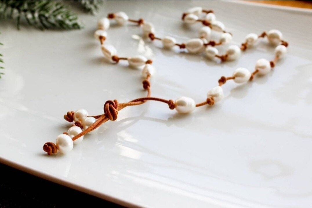 Baroque White Pearl knotted onto natural tan Leather necklace